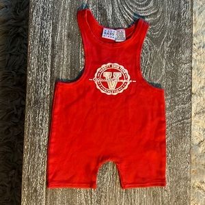 8/$16 Macy’s size 12-18 mon orange wrestling suit. 2 small spots in last photo